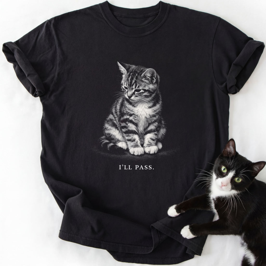 Black I'll Pass graphic tee with seated tabby kitten illustration and white text