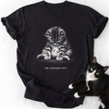Black comfort colors t-shirt featuring 'I'm Clocked Out' cat lover design