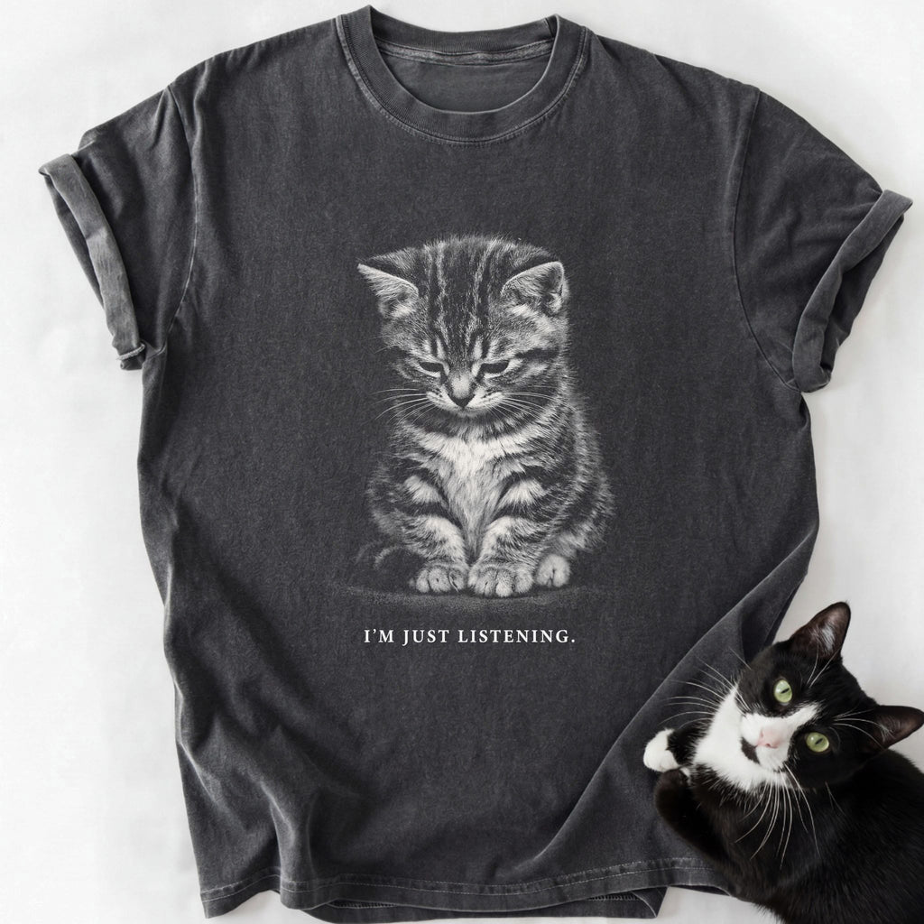 Dark gray garment-dyed cotton t-shirt with seated tabby kitten graphic and 'I'm Just Listening' text