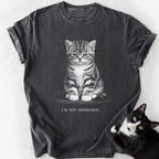 Dark gray garment-dyed cat lover t-shirt featuring 'I'm Not Impressed' kitten print
