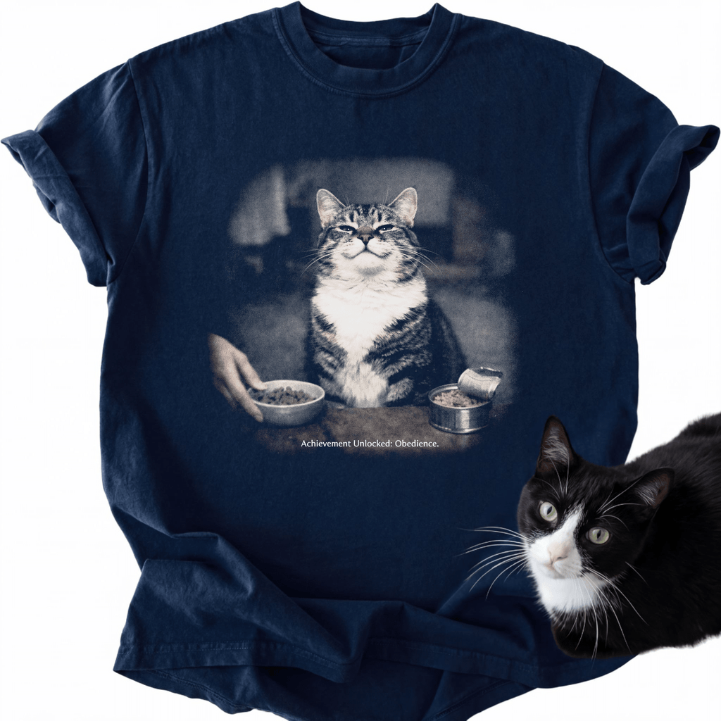 Navy blue garment-dyed cotton t-shirt featuring humorous tabby cat obedience design