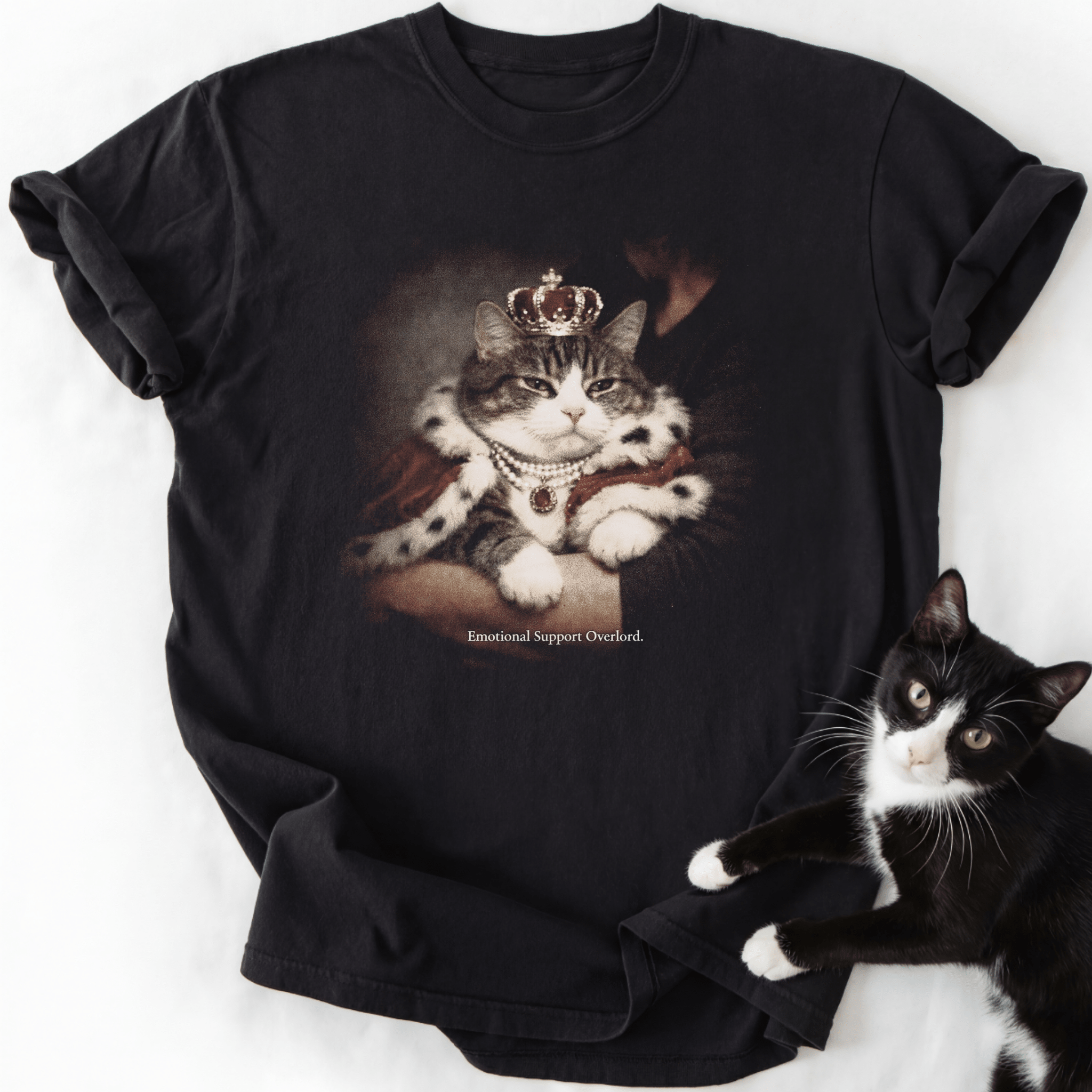 Black relaxed fit t-shirt featuring crowned tabby cat graphic and Emotional Support Overlord text