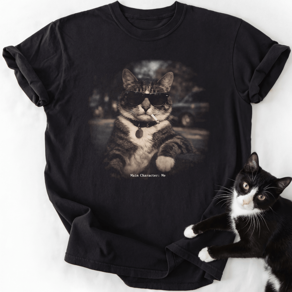 Black vintage cat graphic tee with 'Main Character Me' text and sunglasses tabby design
