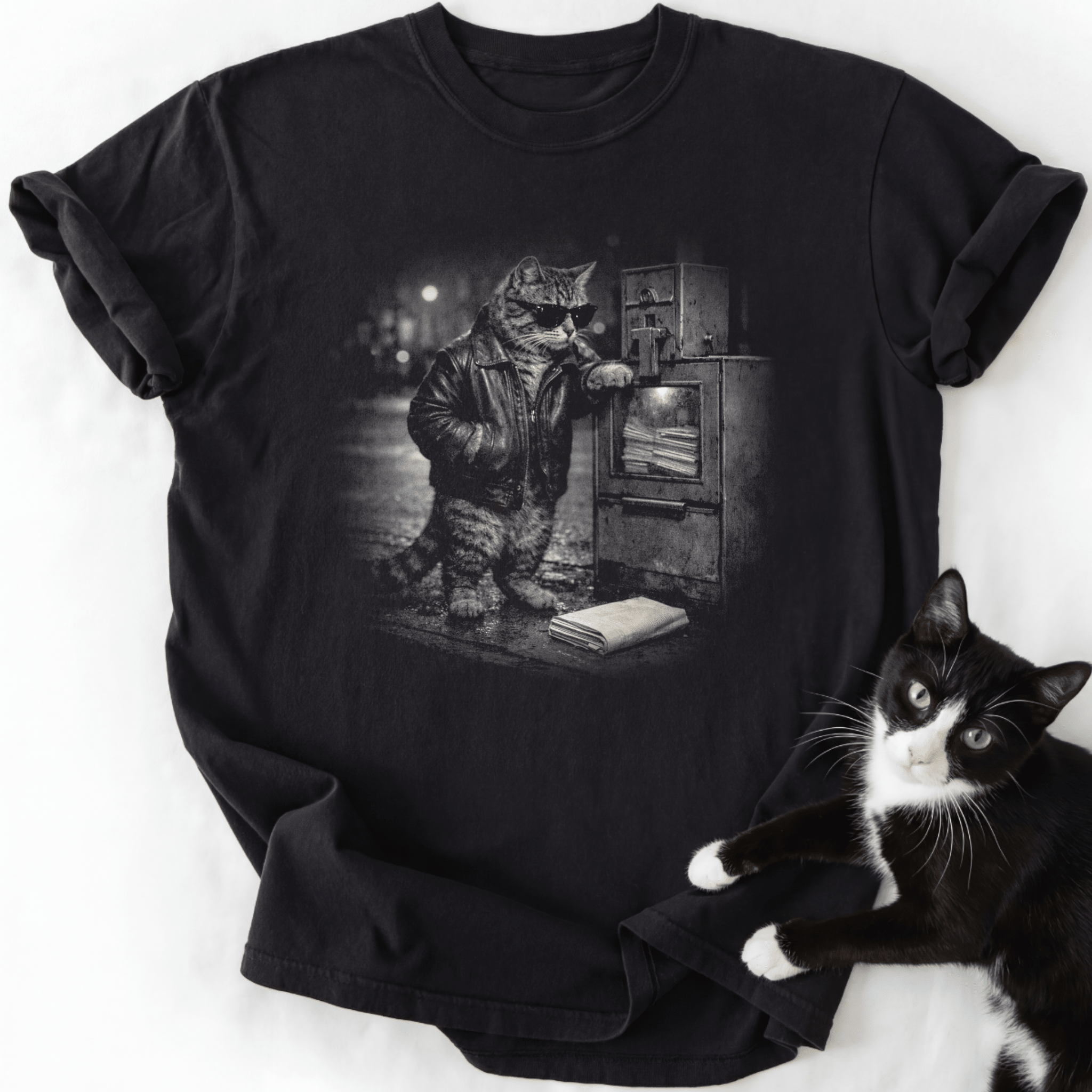 Midnight Newsstand T-Shirt with noir tabby cat graphic and real black-and-white cat