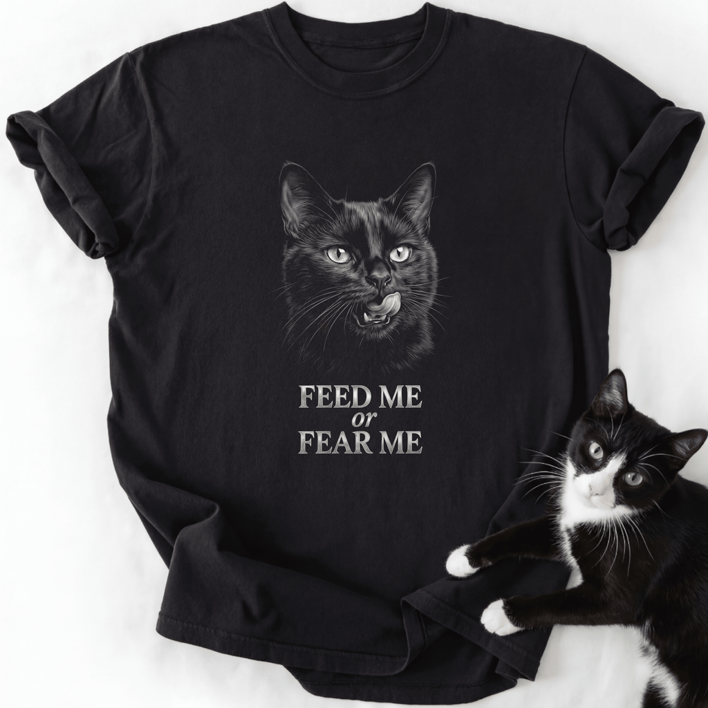 Black Feed or Fear Me cat graphic tee with grayscale cat illustration and text