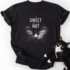 Black crew neck cat lover shirt with yellow-eyed feline graphic and humorous quote