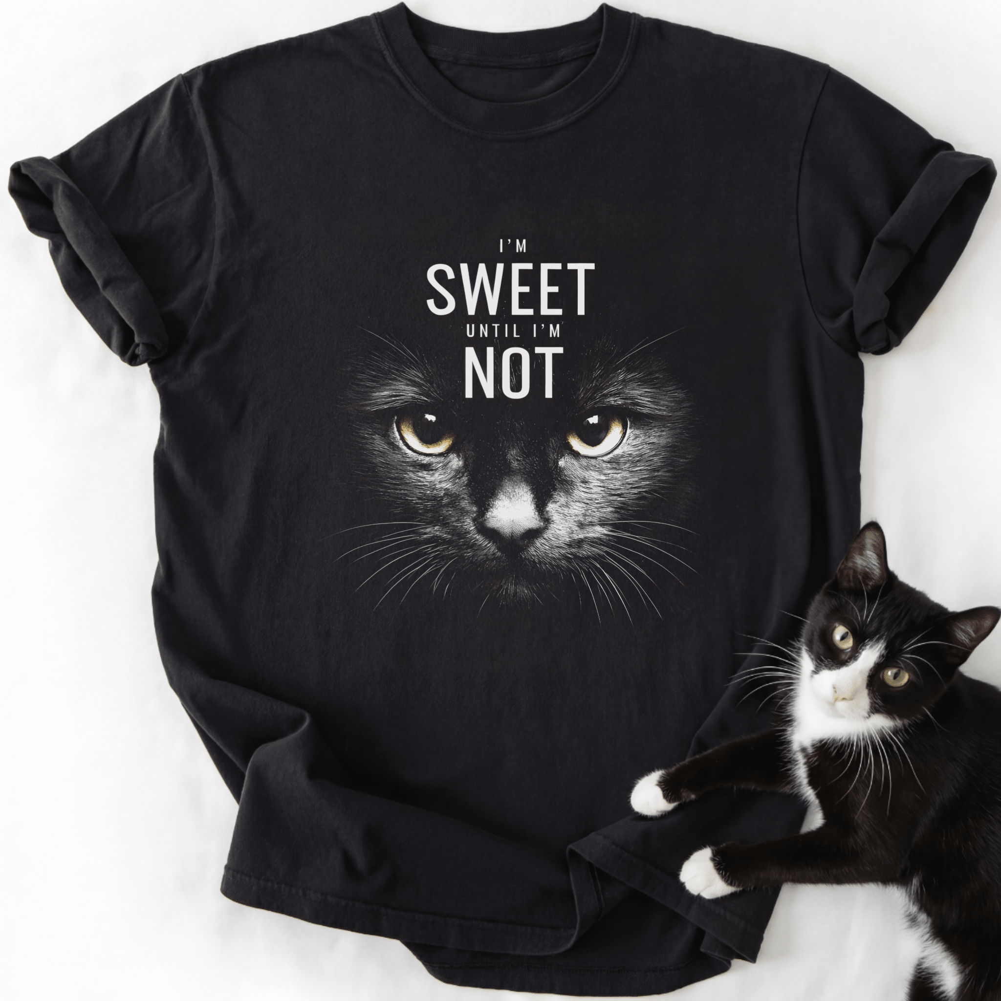 Black crew neck cat lover shirt with yellow-eyed feline graphic and humorous quote