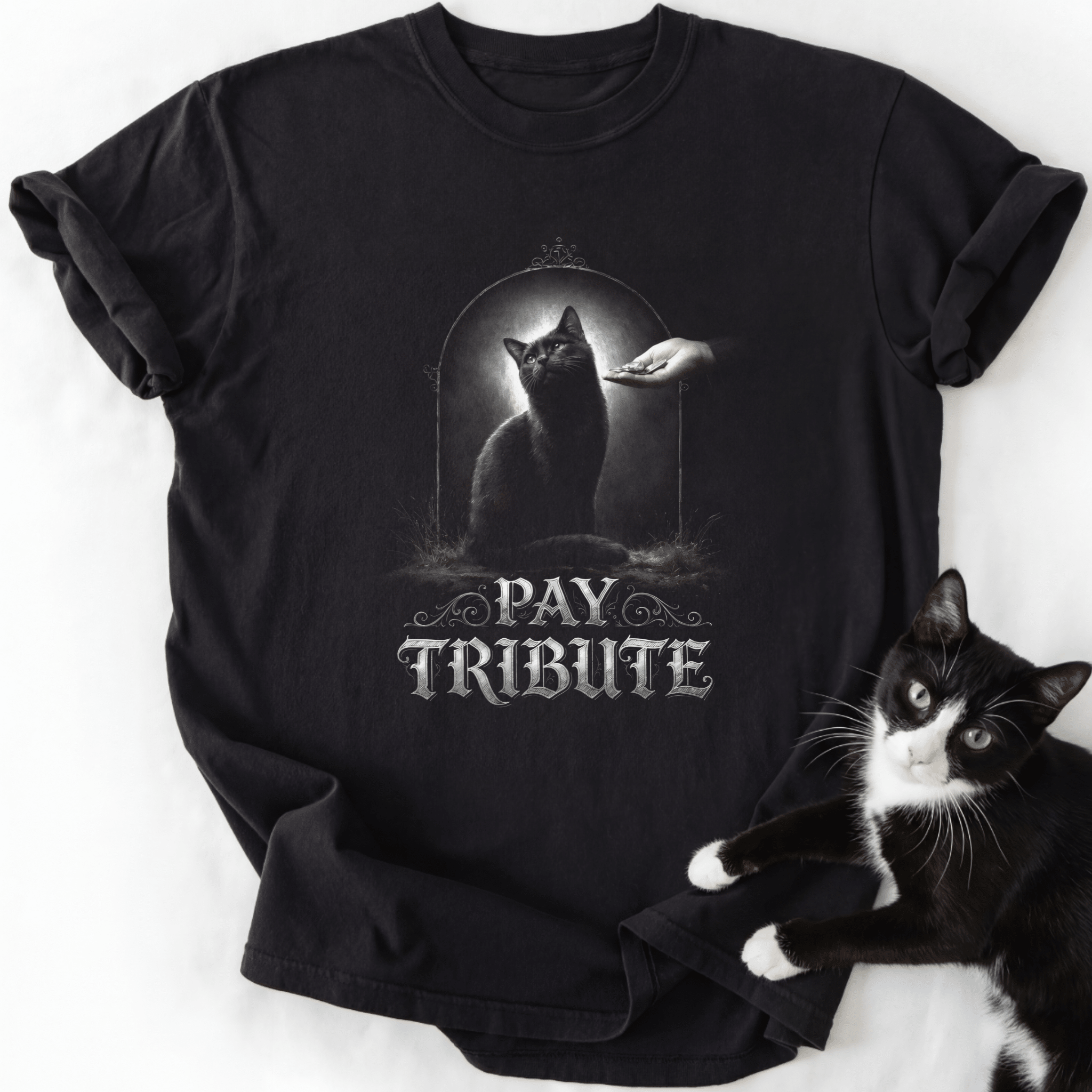 Black Pay Tribute cat graphic tee with double-needle stitching and tubular shape
