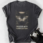 Dark gray Purrcaution cat graphic tee with distressed text and soft-washed cotton