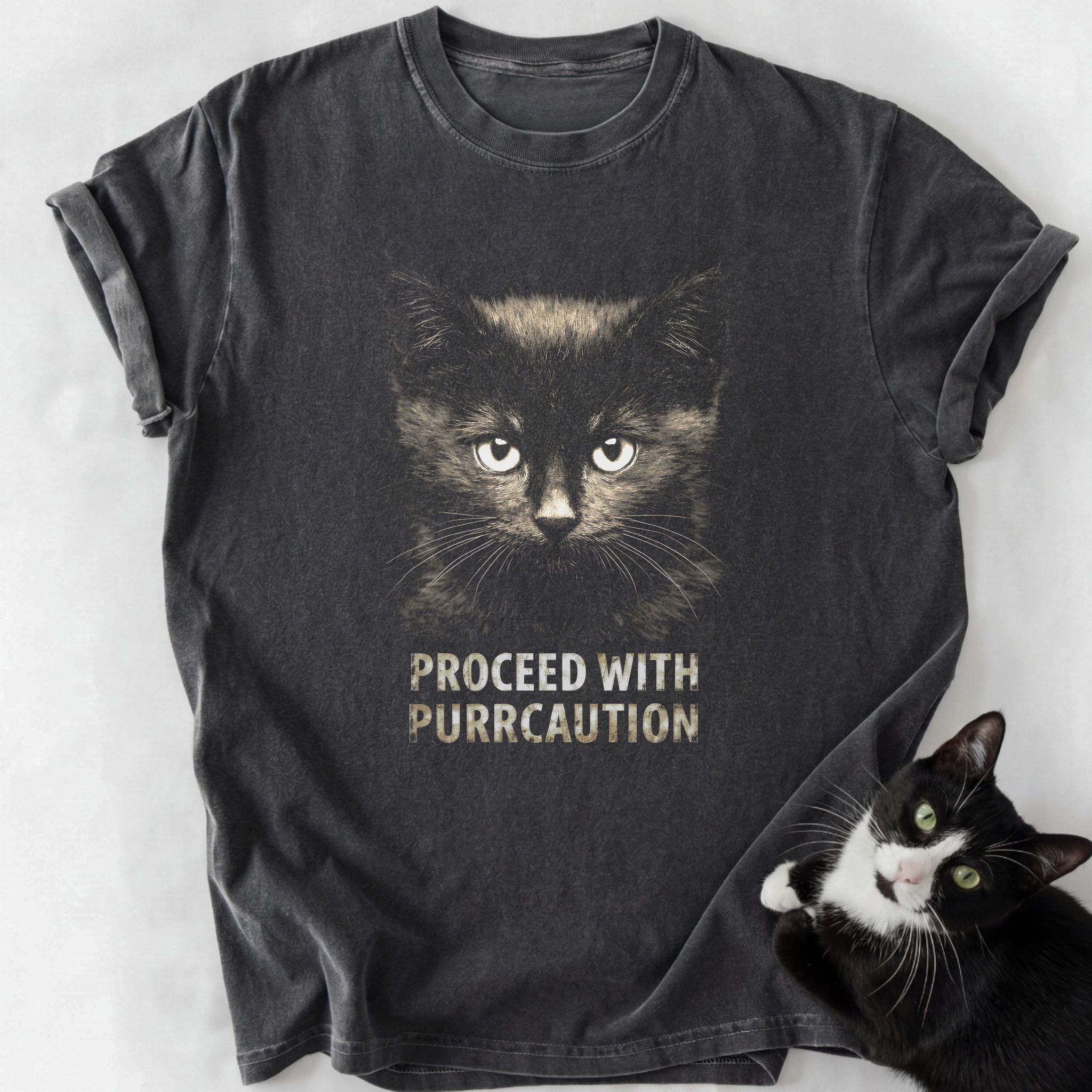 Dark gray Purrcaution cat graphic tee with distressed text and soft-washed cotton