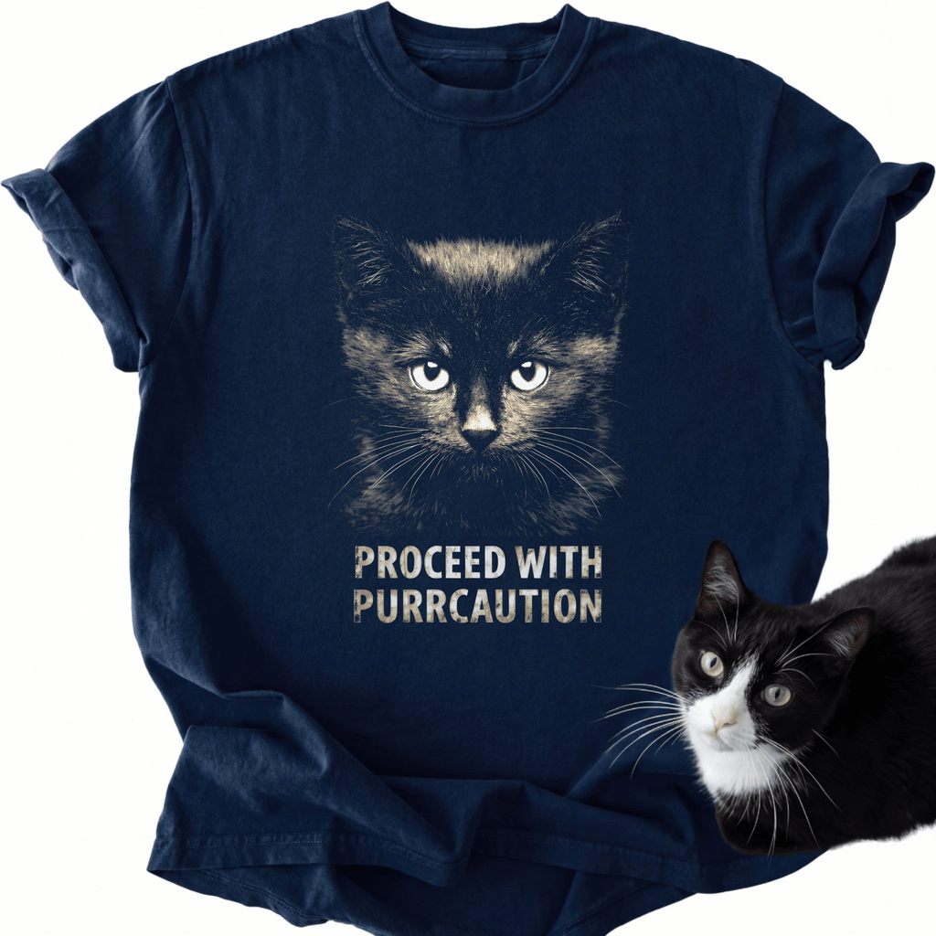 Navy blue Purrcaution cat face t-shirt featuring green eyes and relaxed fit