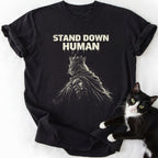 Black relaxed fit cotton tee with white crowned cat illustration and drip text