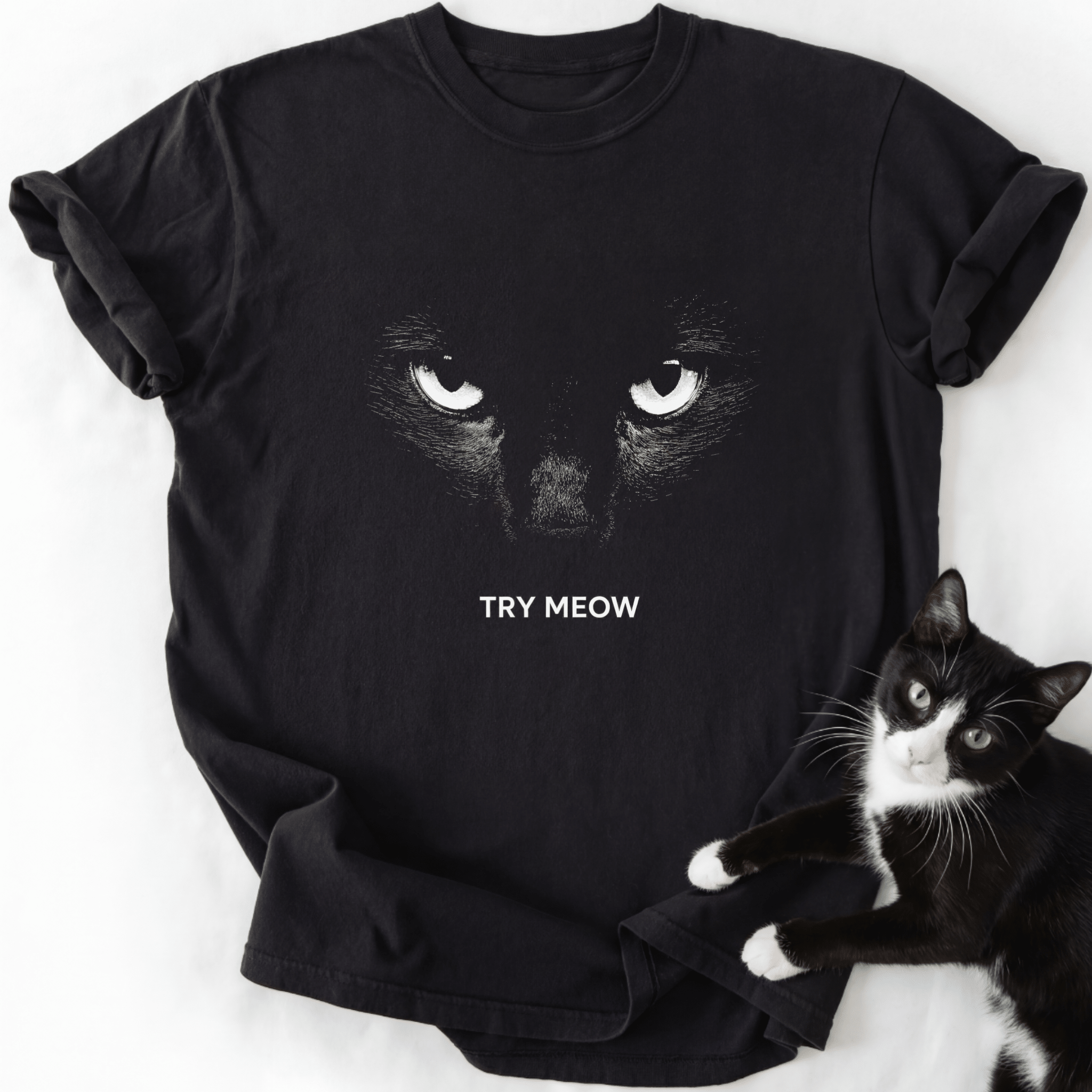 Black Try Meow cat graphic tee featuring white eyes design and relaxed fit