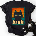 Black Cat Bruh graphic tee in black featuring half-closed cat eyes and bruh text