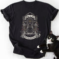 Black short-sleeve t-shirt featuring crowned cat design and 'Bow to the Purring Overlord' print