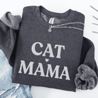 Maroon cat mama embroidered sweatshirt, folded flat on light denim