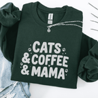 Forest Green cats coffee mama embroidered sweatshirt with paw print detail, folded flat on light denim
