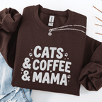 Dark Chocolate cats coffee mama embroidered sweatshirt with paw print detail, folded flat on light denim