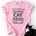 Blossom cat mom t-shirt with “This Is What an Awesome Cat Mom Looks Like” graphic displayed with a black cat beside the shirt
