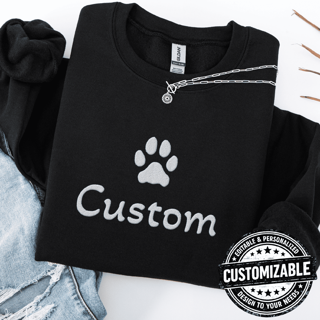 Black cat embroidered sweatshirt with white paw print and customizable text