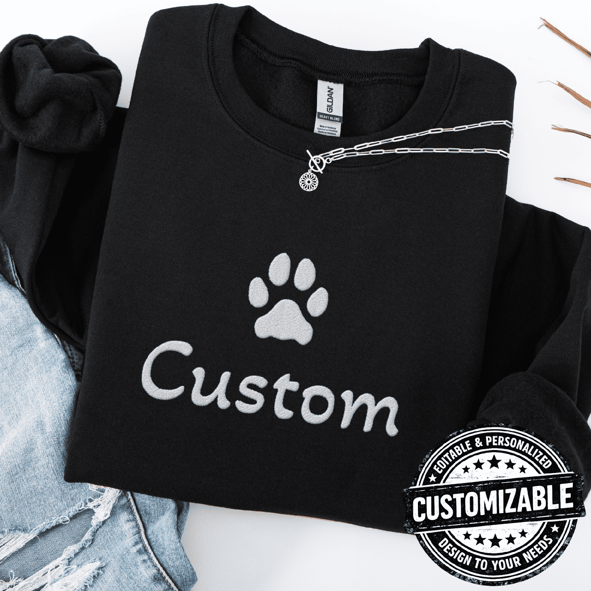 Black cat embroidered sweatshirt with white paw print and customizable text