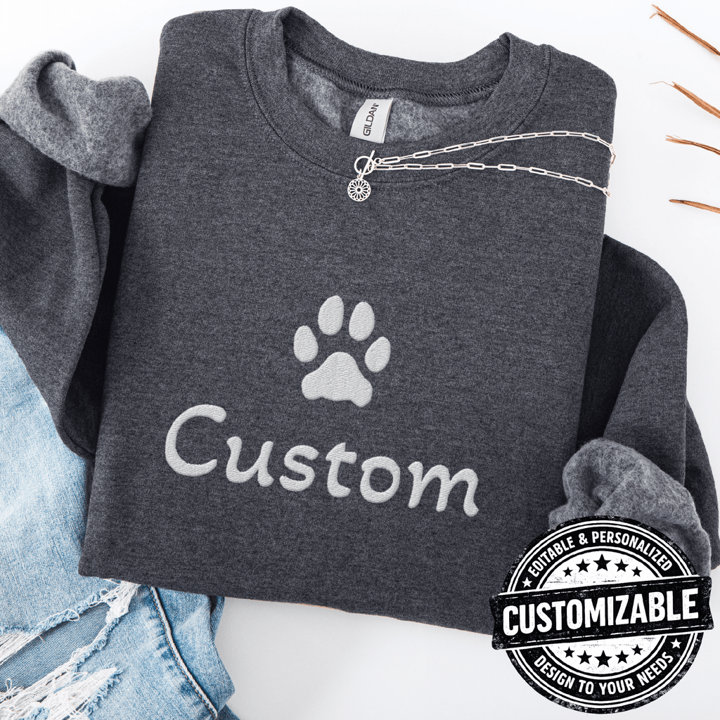Dark heather cat embroidered sweatshirt with white paw print and customizable text