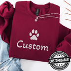 Maroon cat embroidered sweatshirt with white paw print and customizable text