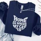 Navy embroidered cat sweatshirt with the phrase “Home Is Where My Cat Is” shown folded flat