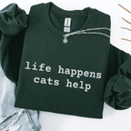 Forest Green embroidered cat sweatshirt with the phrase “life happens cats help” shown folded flat