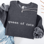 Dark Heather embroidered cat sweatshirt with the phrase “queen of cats” shown folded flat
