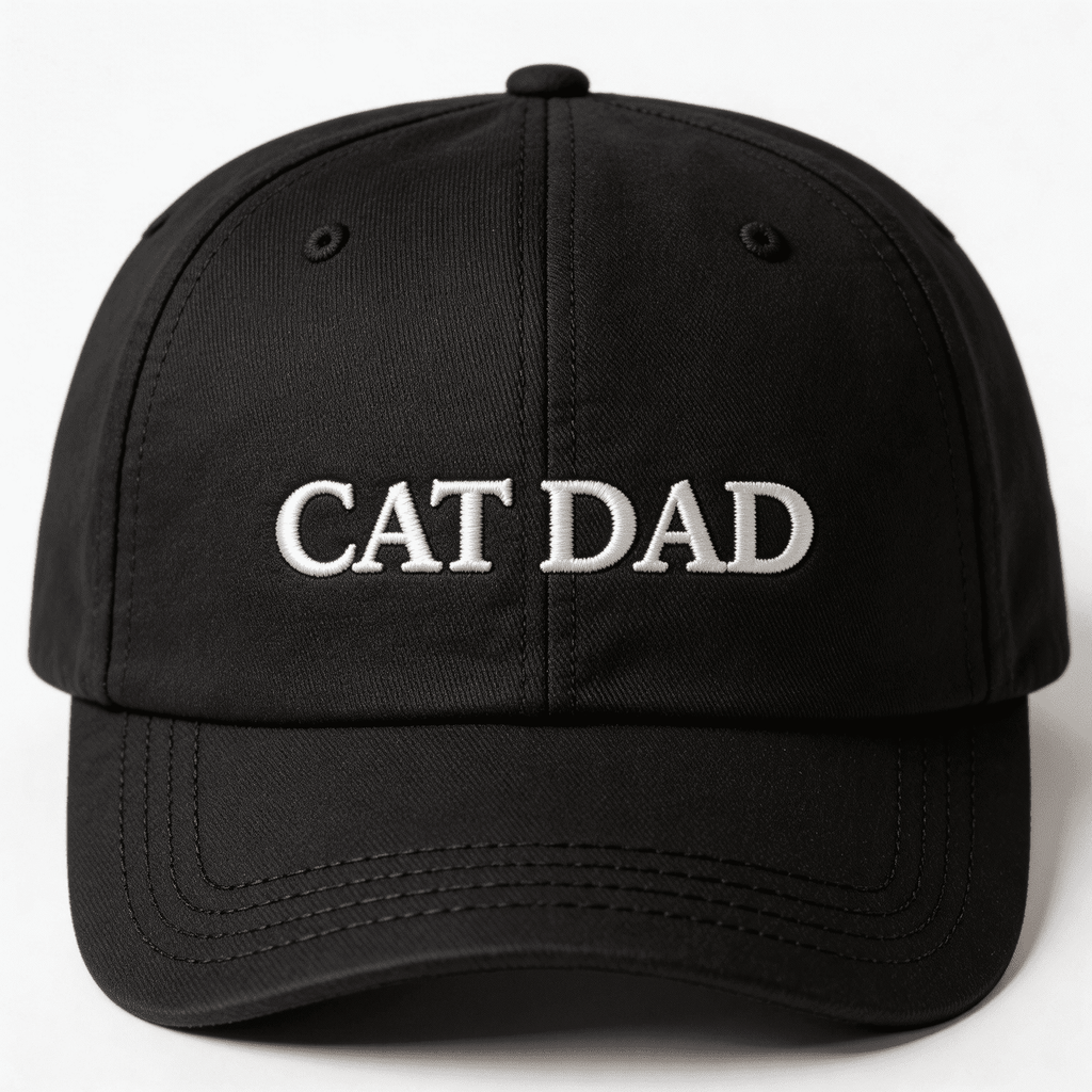 Front view of a black embroidered cat dad cap with CAT DAD text on the front