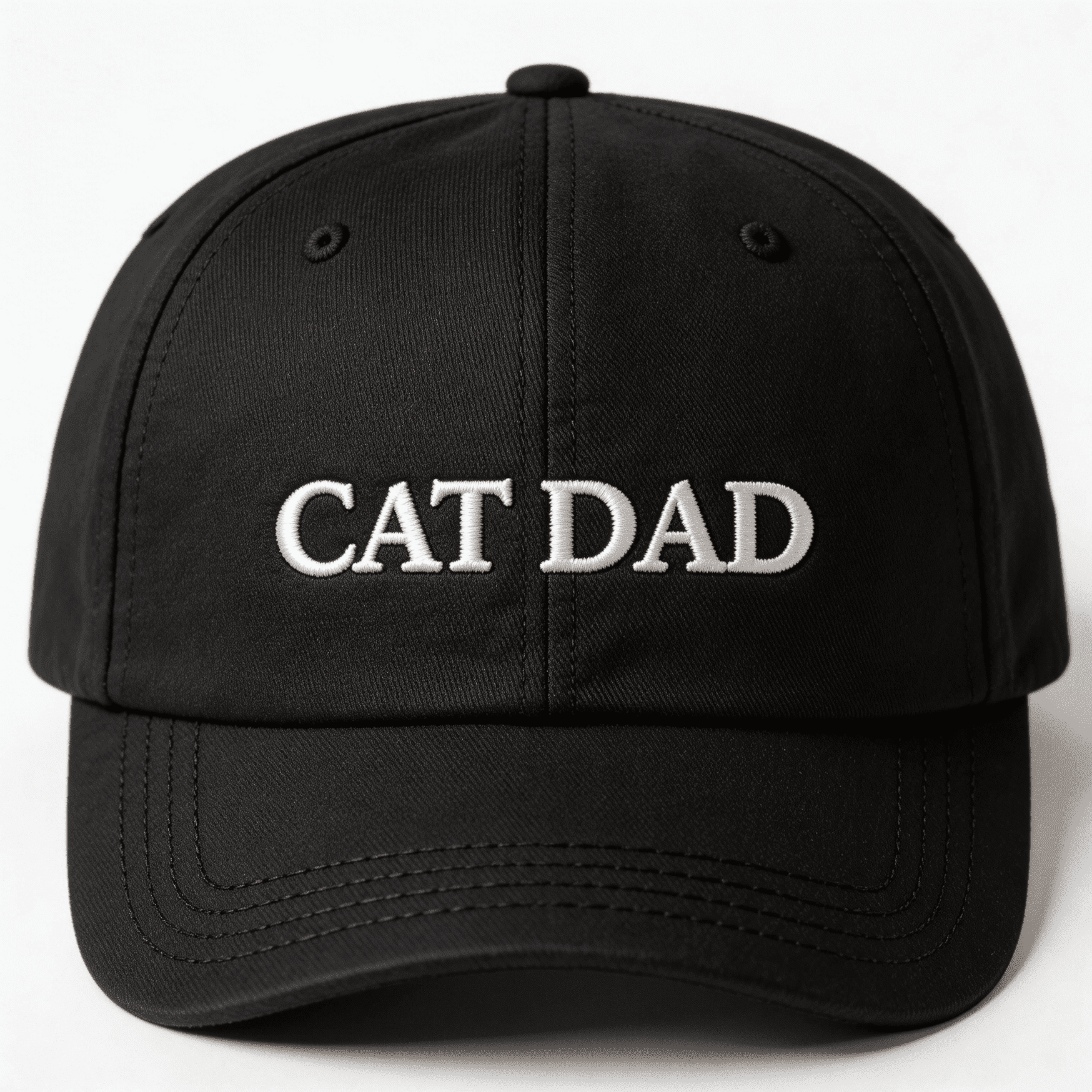 Front view of a black embroidered cat dad cap with CAT DAD text on the front