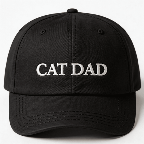 Front view of a black embroidered cat dad cap with CAT DAD text on the front