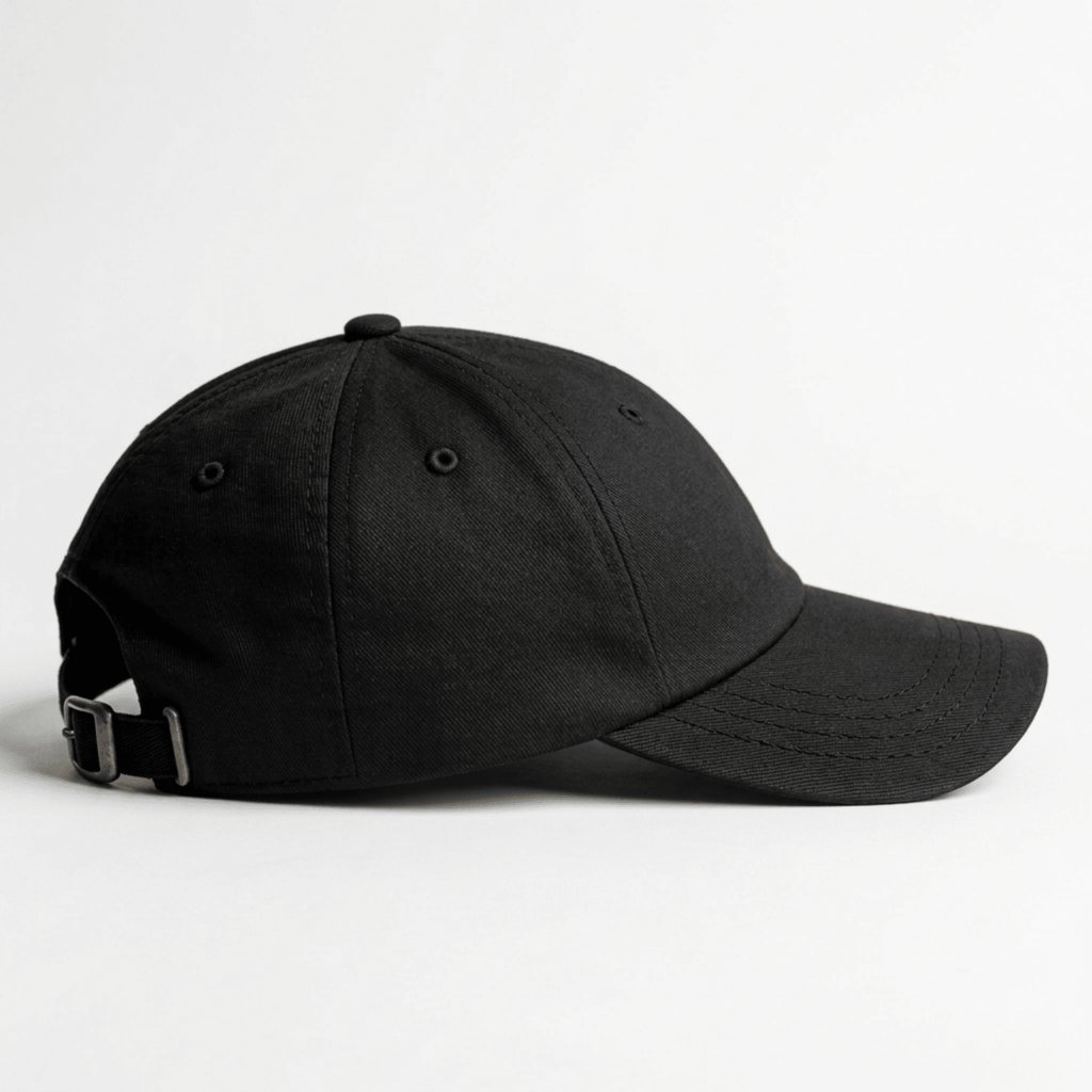 Side view of a black embroidered cap with curved brim and adjustable back strap