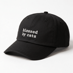 Angled front view of black blessed by cats embroidered cap