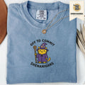 Blue jean embroidered funny cat t shirt with Commit Shenanigans text and mischievous cat design