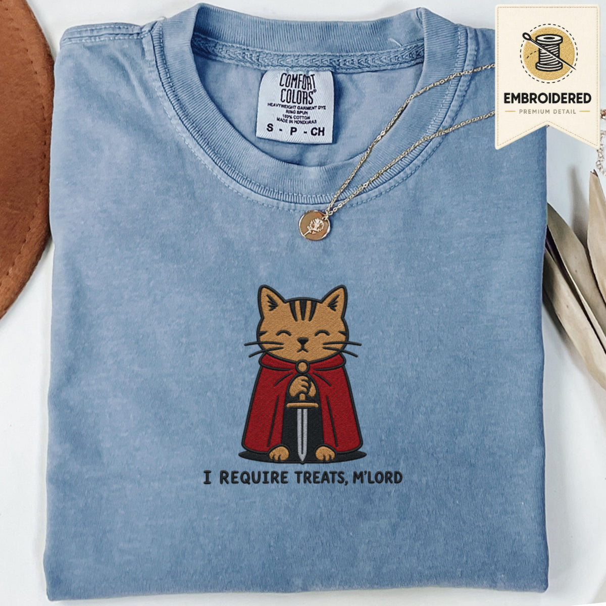 Blue jean embroidered funny cat t shirt with Require Treats orange cat graphic