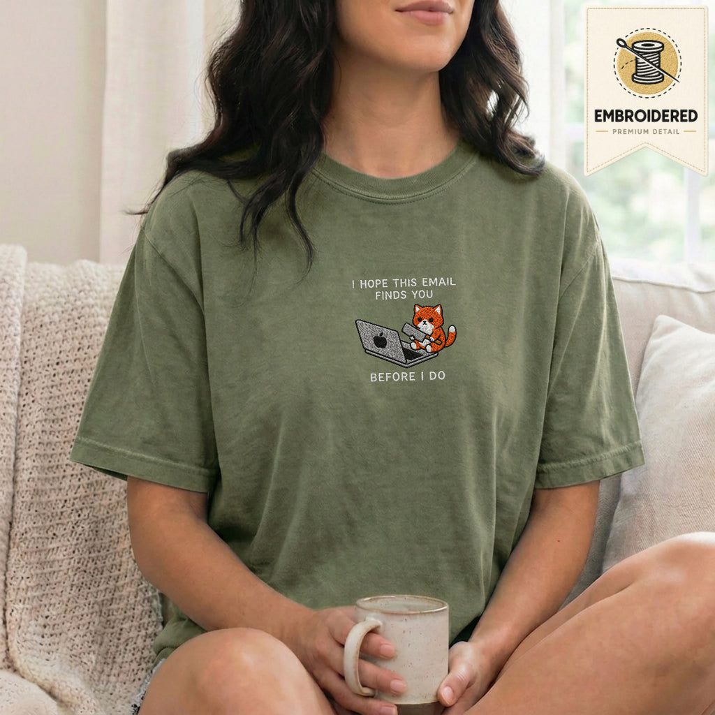 Woman wearing a blue jean embroidered funny cat t shirt with Before I Do cat design while standing indoors