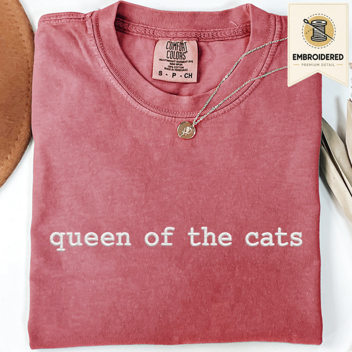 Crimson embroidered cat t shirt with queen of the cats text