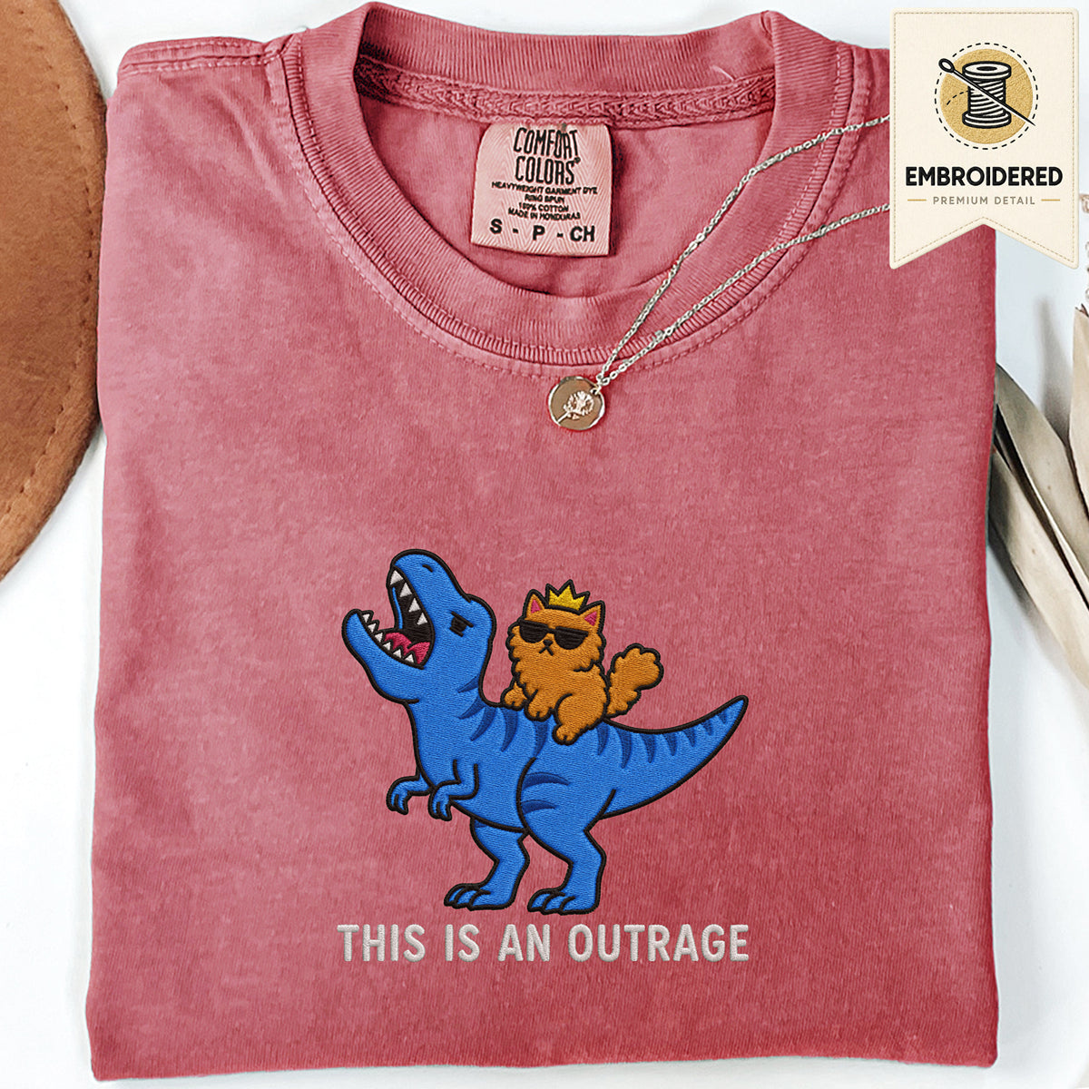 Crimson embroidered funny cat t shirt with This Is An Outrage cat design