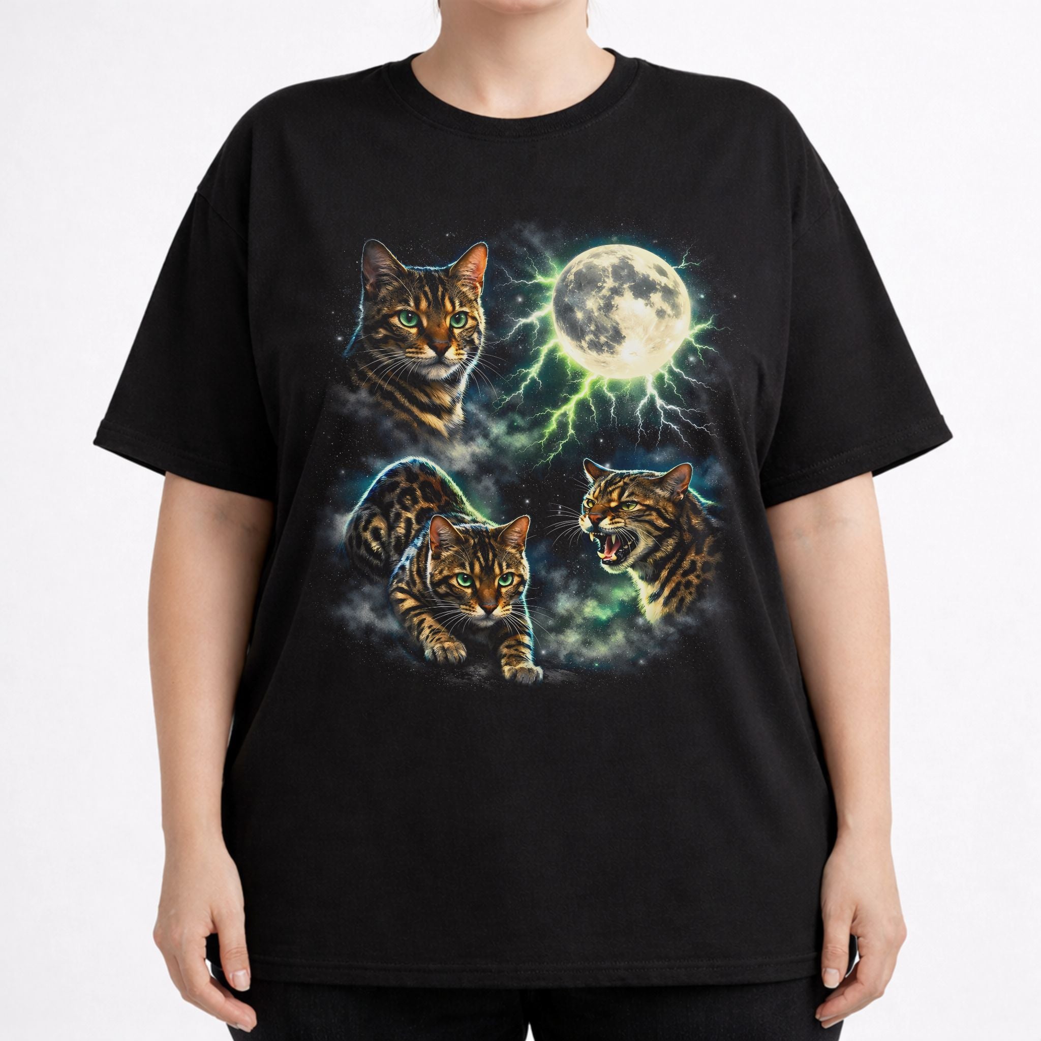 Front view of black cat t shirt on a model with detailed Bengal cat and moon graphic