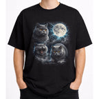 Front view of black cat t shirt on a model with detailed British Shorthair cat and moon graphic