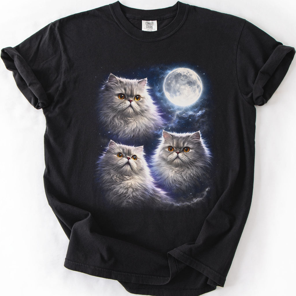 Black graphic cat t shirt with moonlit Persian cat artwork and glowing full moon, folded flat
