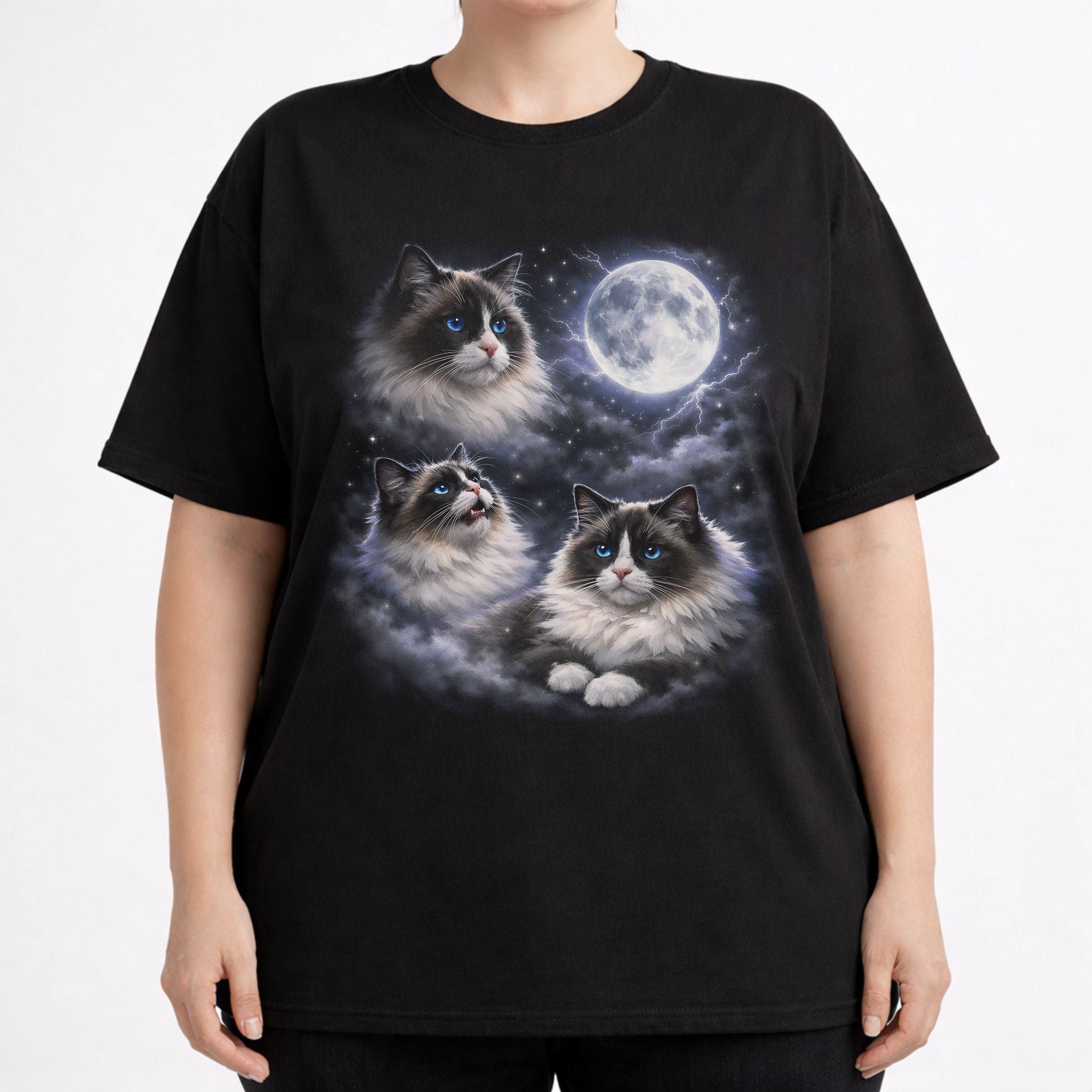 Model wearing a black graphic cat tee with moonlit Ragdoll cat design and full moon artwork