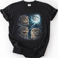 Black graphic cat t shirt with moonlit Scottish Fold cat artwork and glowing full moon, folded flat