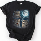 Black graphic cat t shirt with moonlit Scottish Fold cat artwork and glowing full moon, folded flat