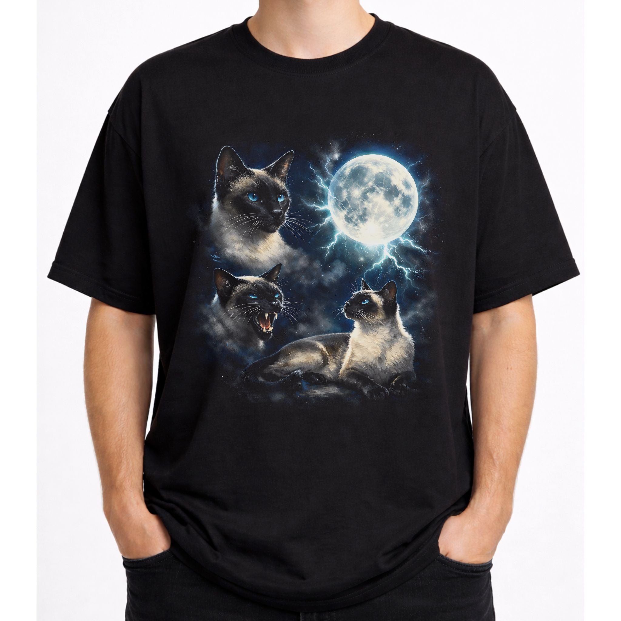 Model wearing a black graphic cat tee with moonlit Siamese cat design and full moon artwork