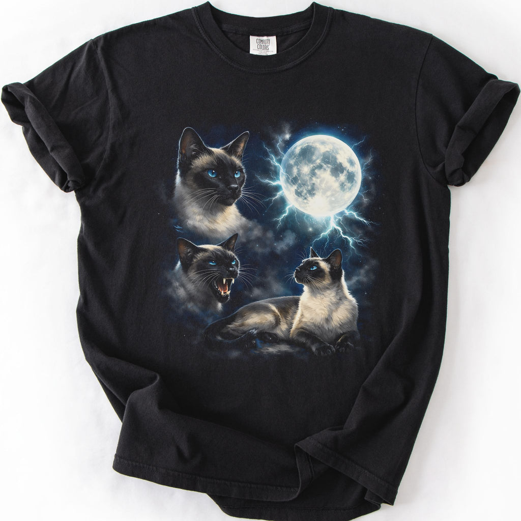 Black graphic cat t shirt with moonlit Siamese cat artwork and glowing full moon, folded flat