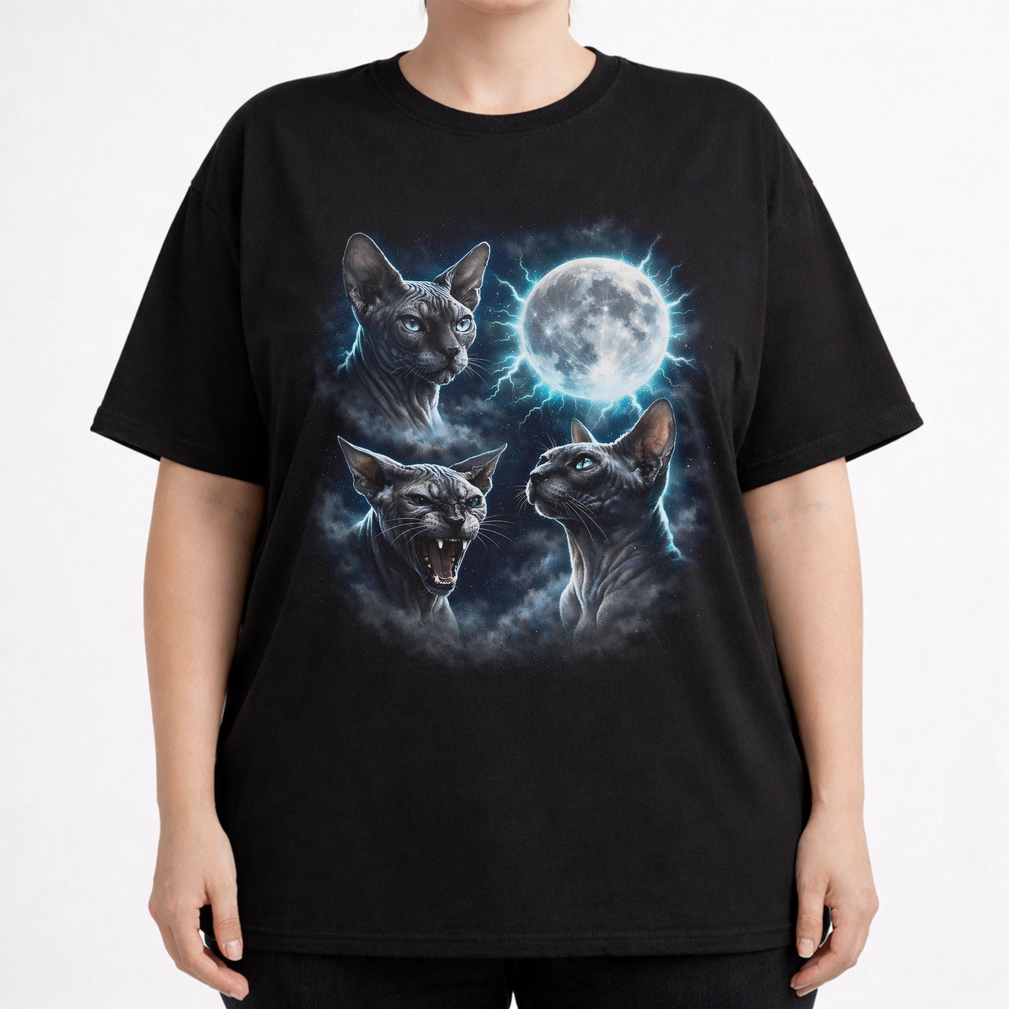 Model wearing a black Moonlit Sphynx graphic cat t shirt with blue cat and moon artwork