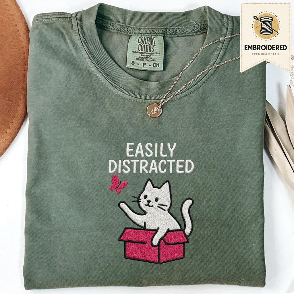 Moss Comfort Colors 1717 t shirt with Easily Distracted text and cat in box embroidered style design, folded flat